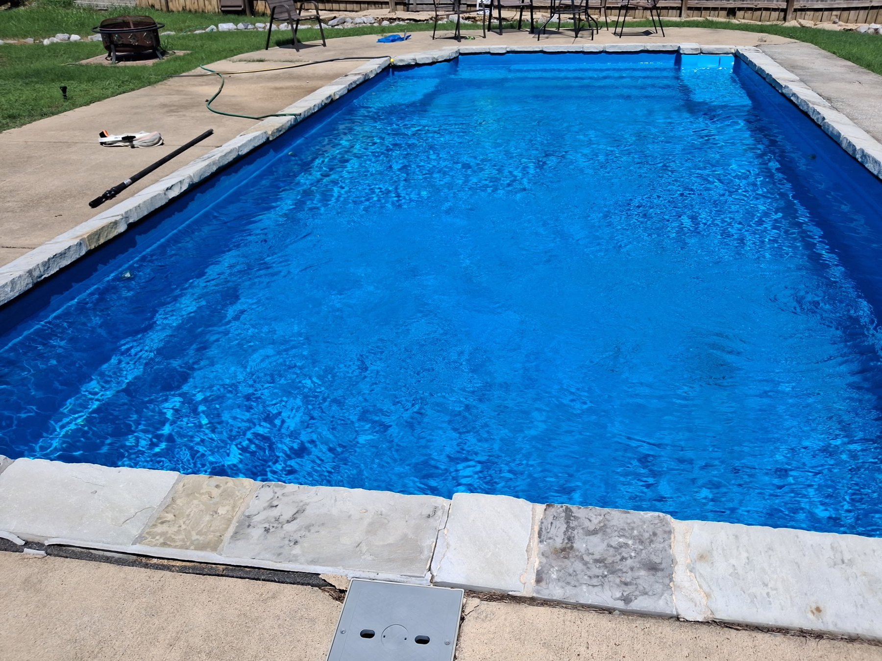 Clear blue swimming pool after pool service